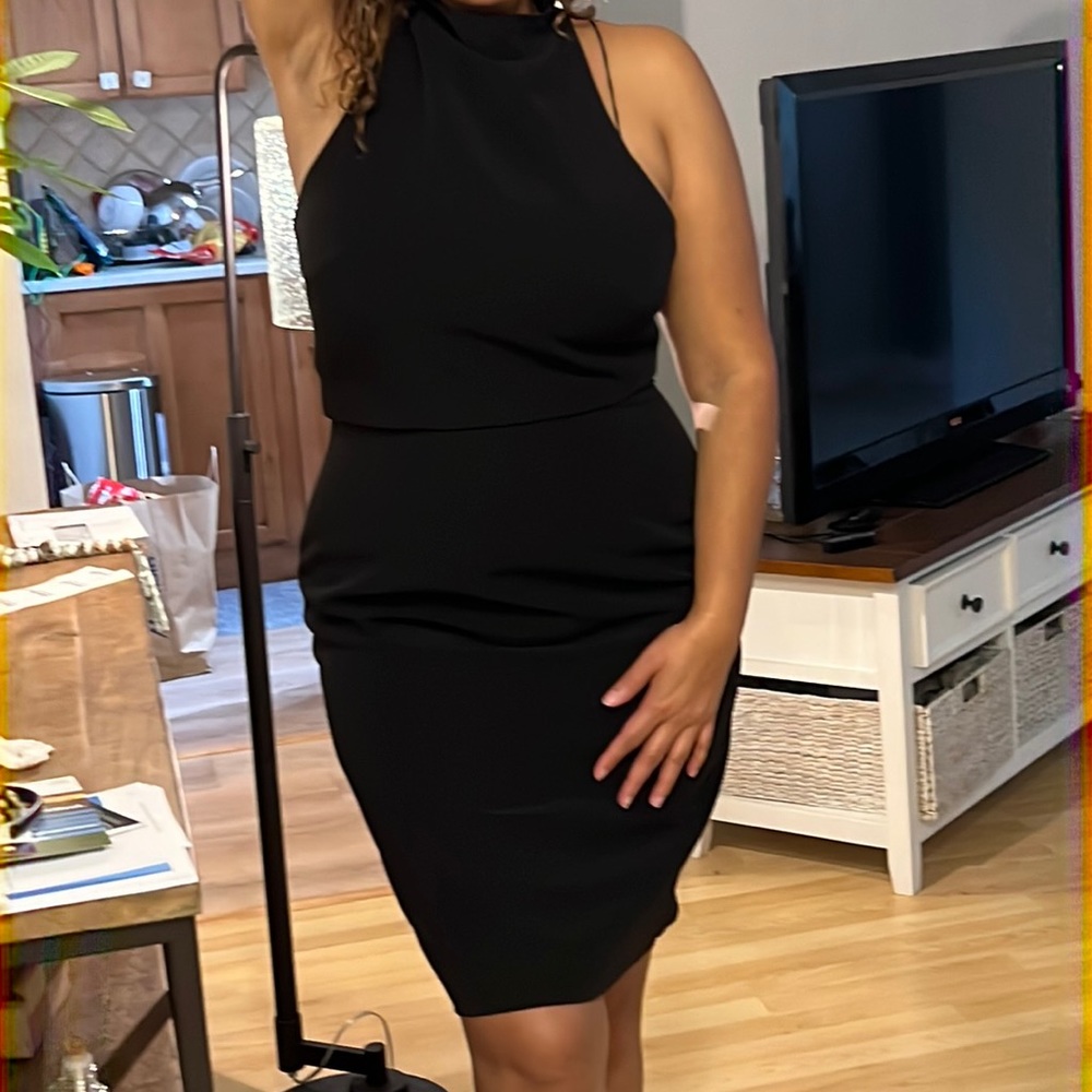 Black cocktail dress over the knees